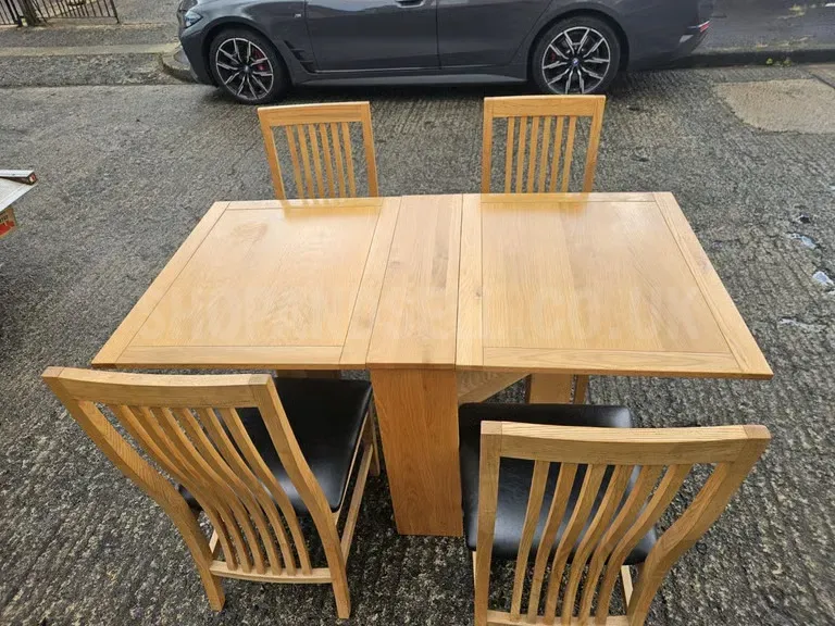 Soild oak drop leaf table and 4 chairs 